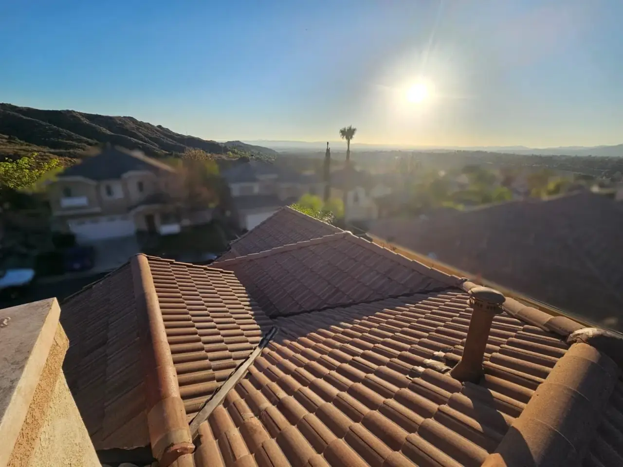 Terracotta tile roof at golden hour