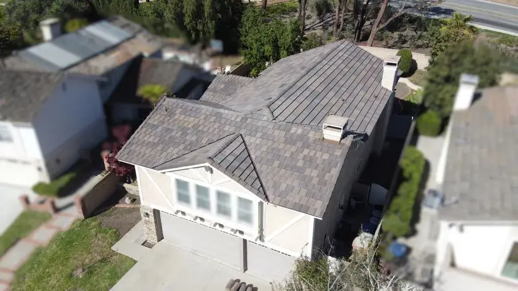 Two-tone shingle roof on a modern residential home